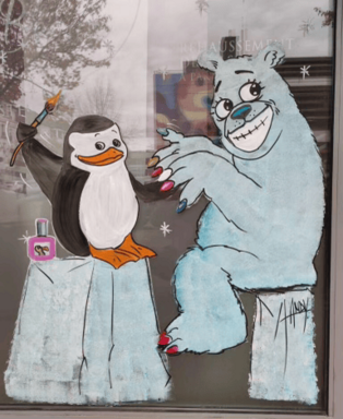 Photo d'une vitrine de commercant décoré pour noël