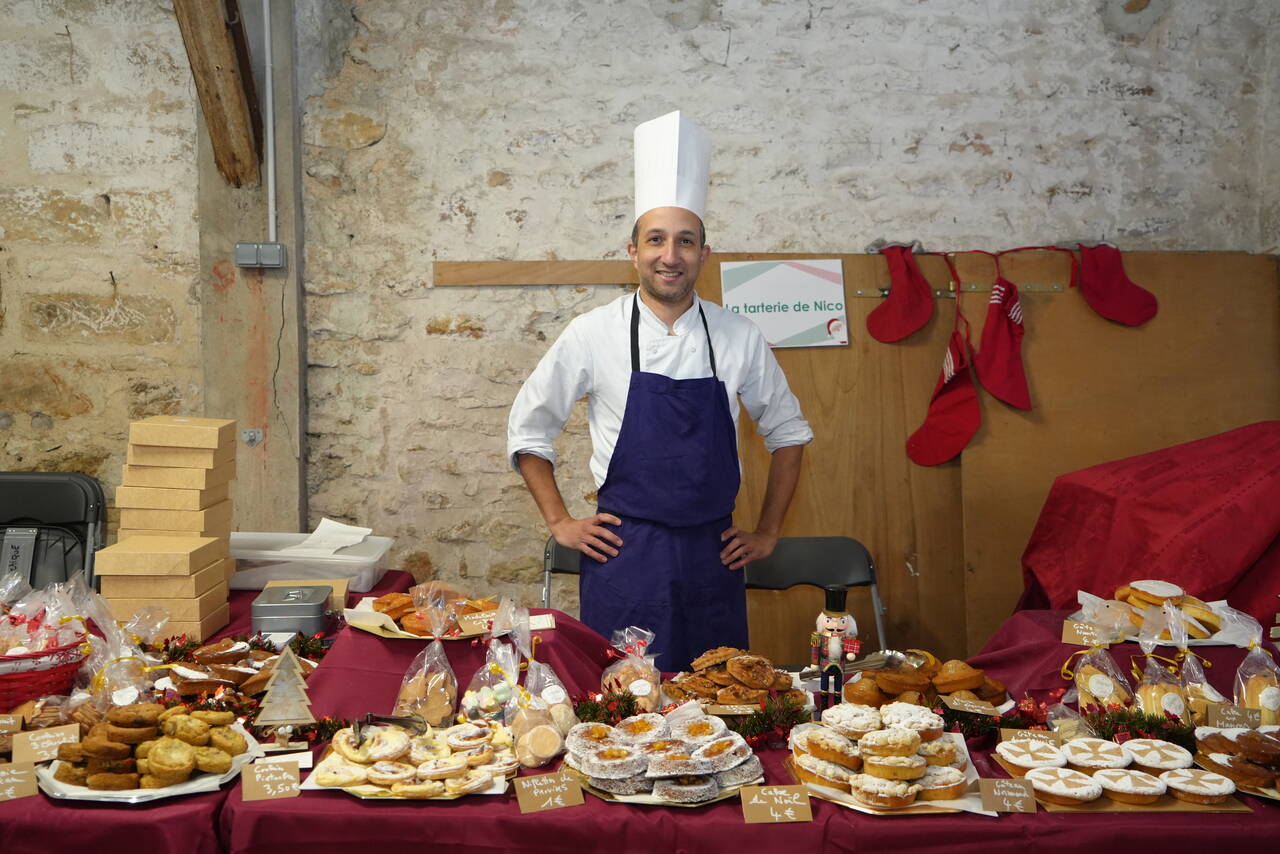 Photo d'un exposant du marché de Noël